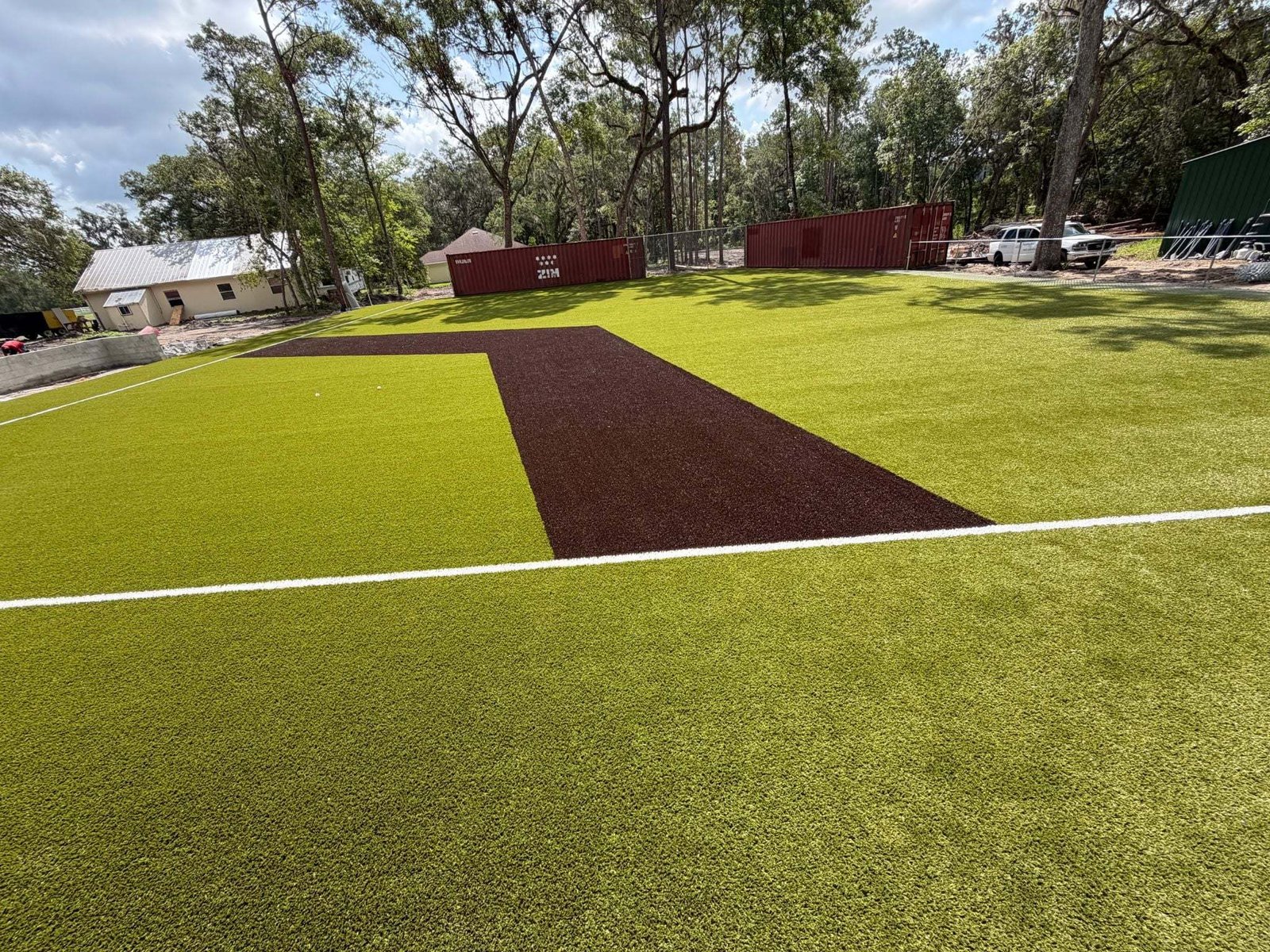 Artificial turf training field with a brown turf base path, installed by ProTurf Solutions